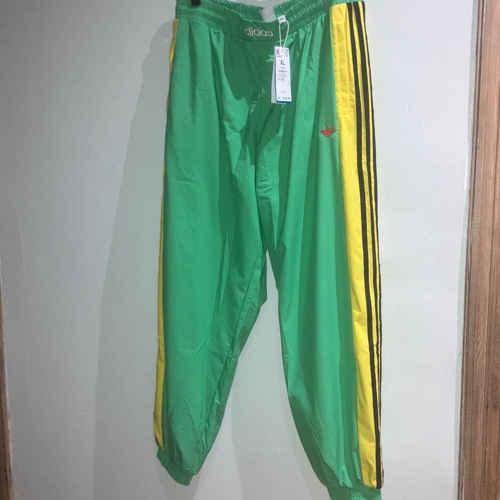 Adidas Green Pants with Yellow Stripes